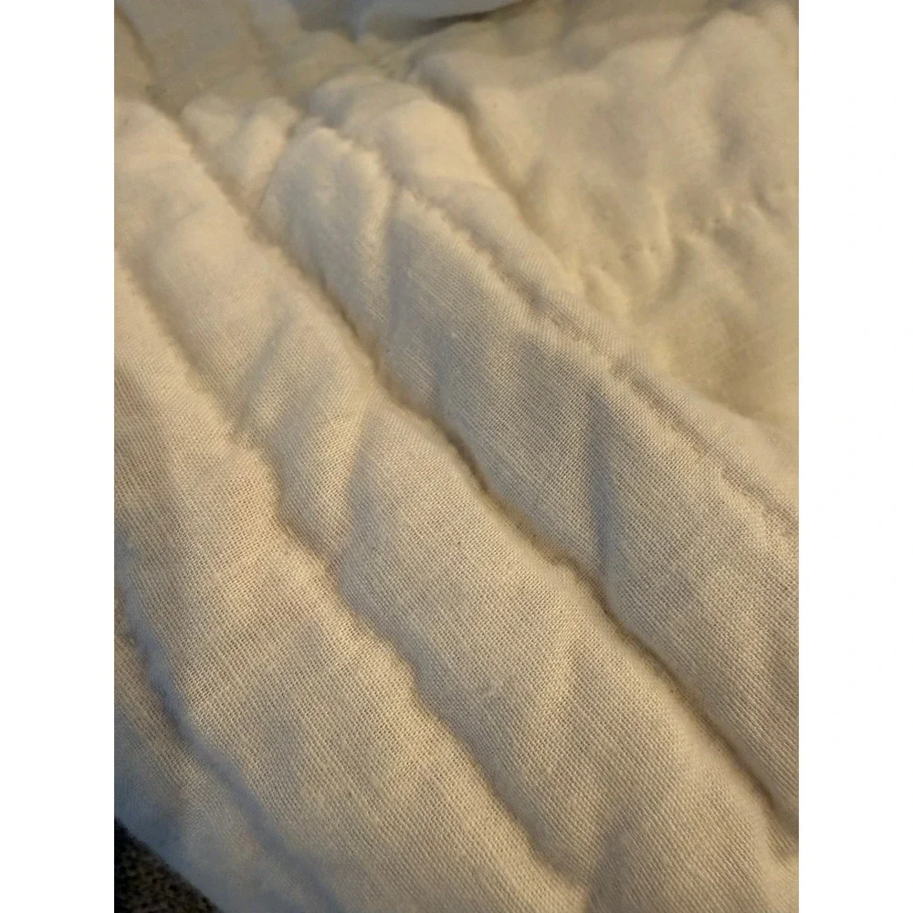 Quilt. Hand quilted.